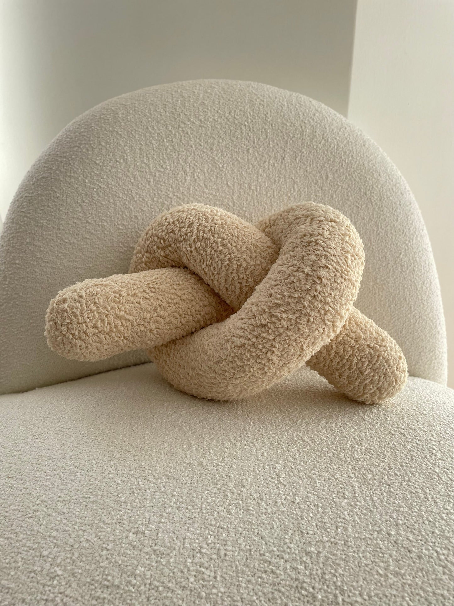 Soft Beige Boucle Knot Pillow: Chunky Decorative Cushion