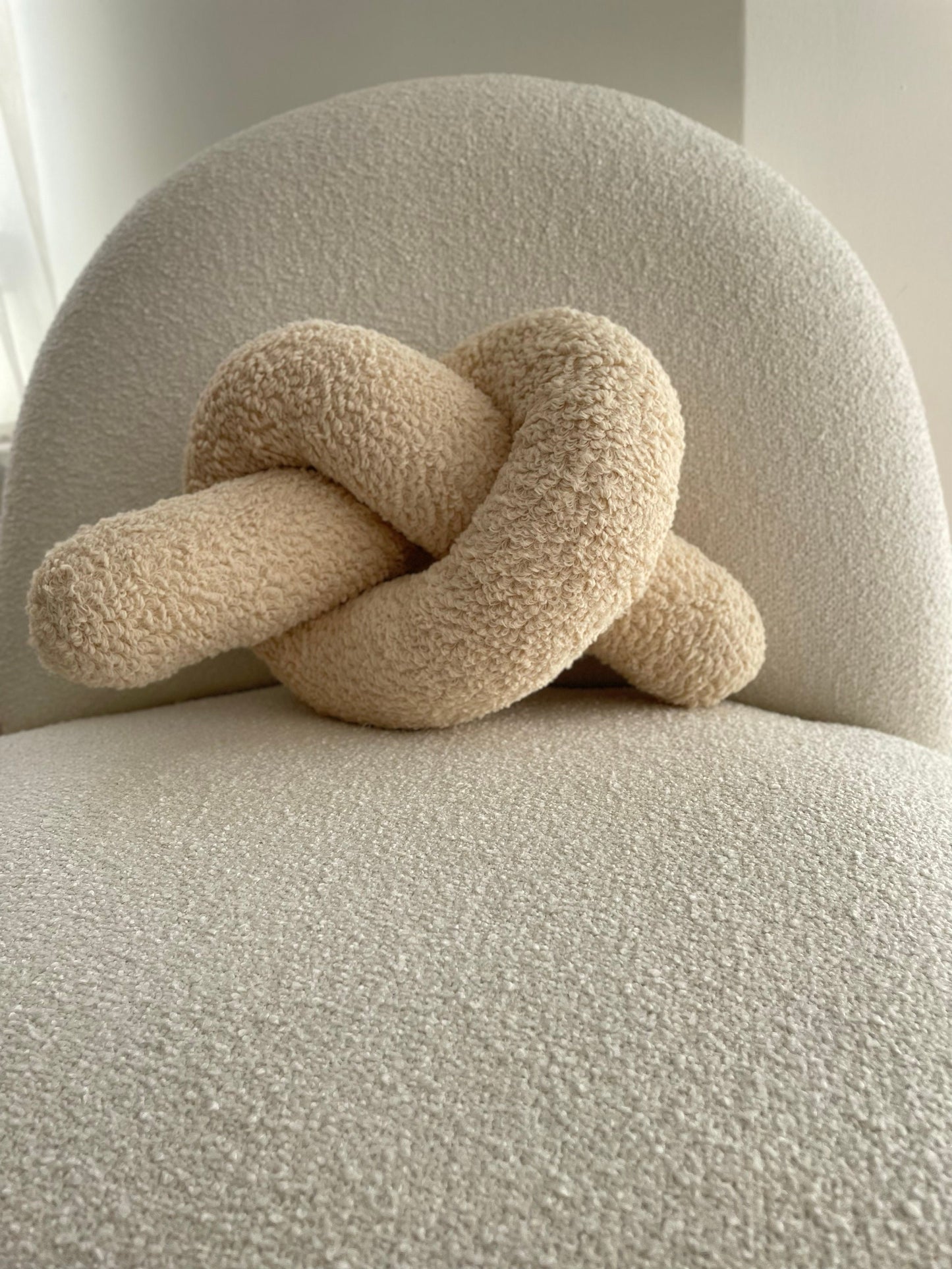 Soft Beige Boucle Knot Pillow: Chunky Decorative Cushion
