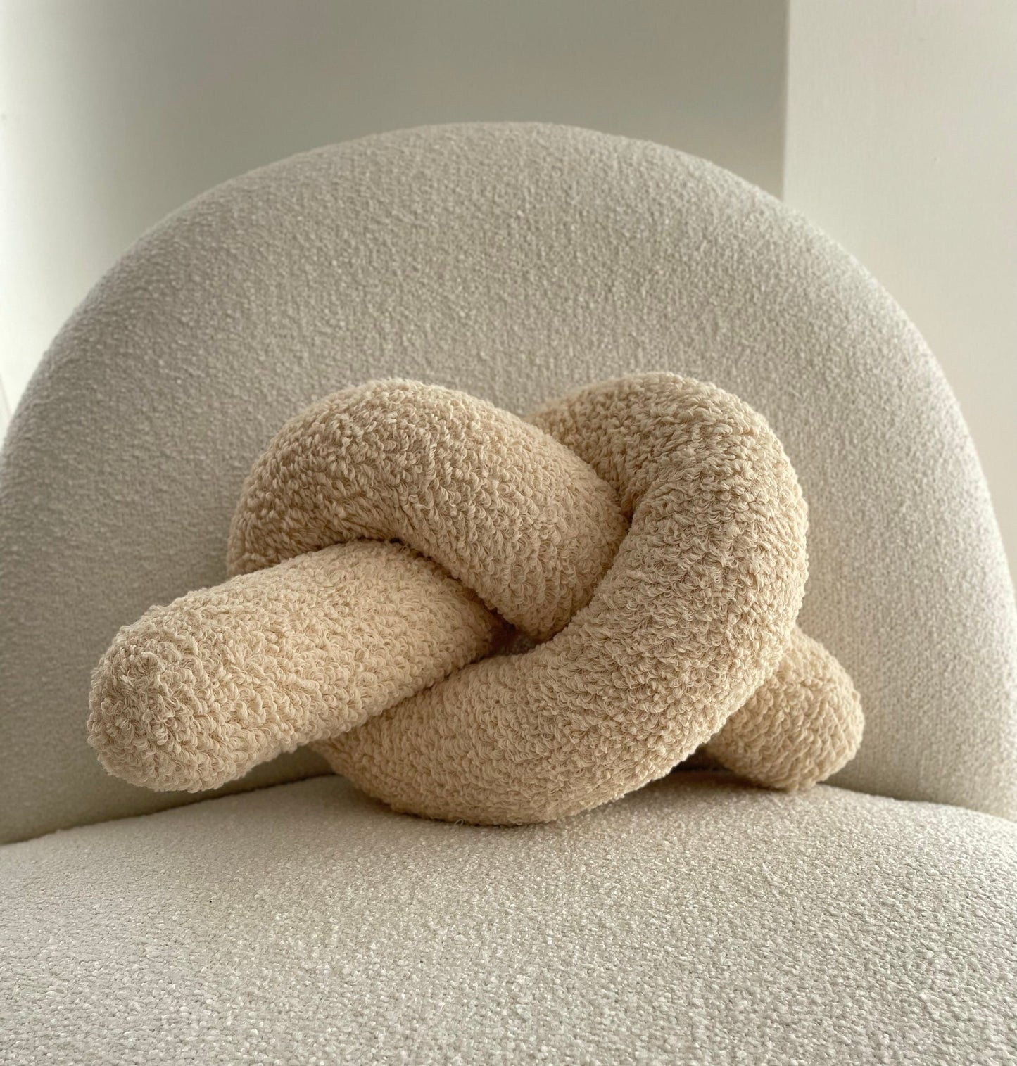 Soft Beige Boucle Knot Pillow: Chunky Decorative Cushion