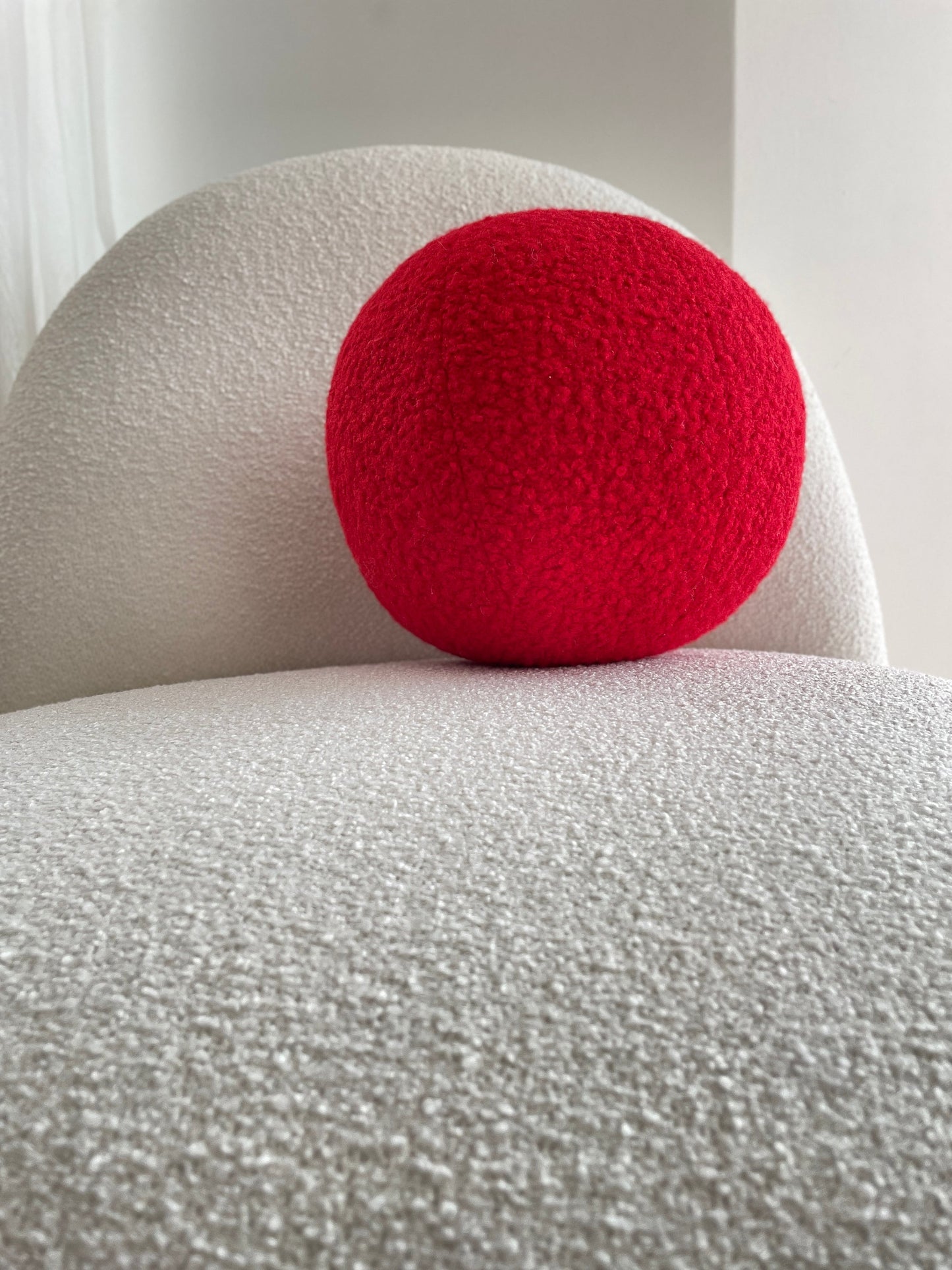 Red Boucle Sphere Cushion: Modern Minimalist Home Decor