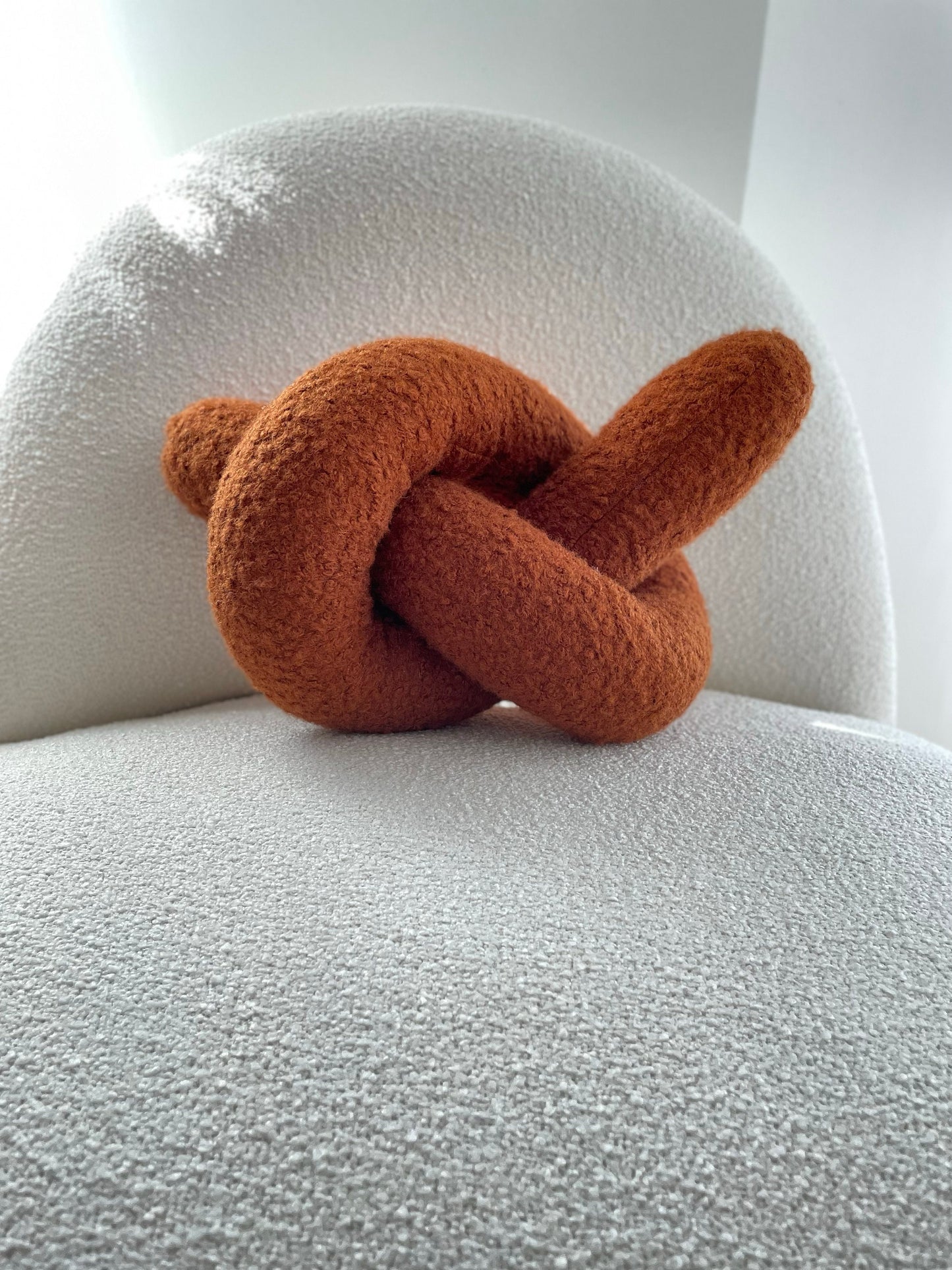 Boucle Knot Pillow: Terracotta Pretzel Plush Cushion