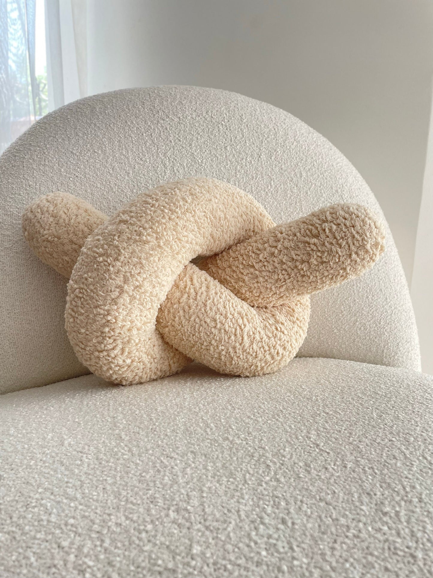 Soft Beige Boucle Knot Pillow: Chunky Decorative Cushion