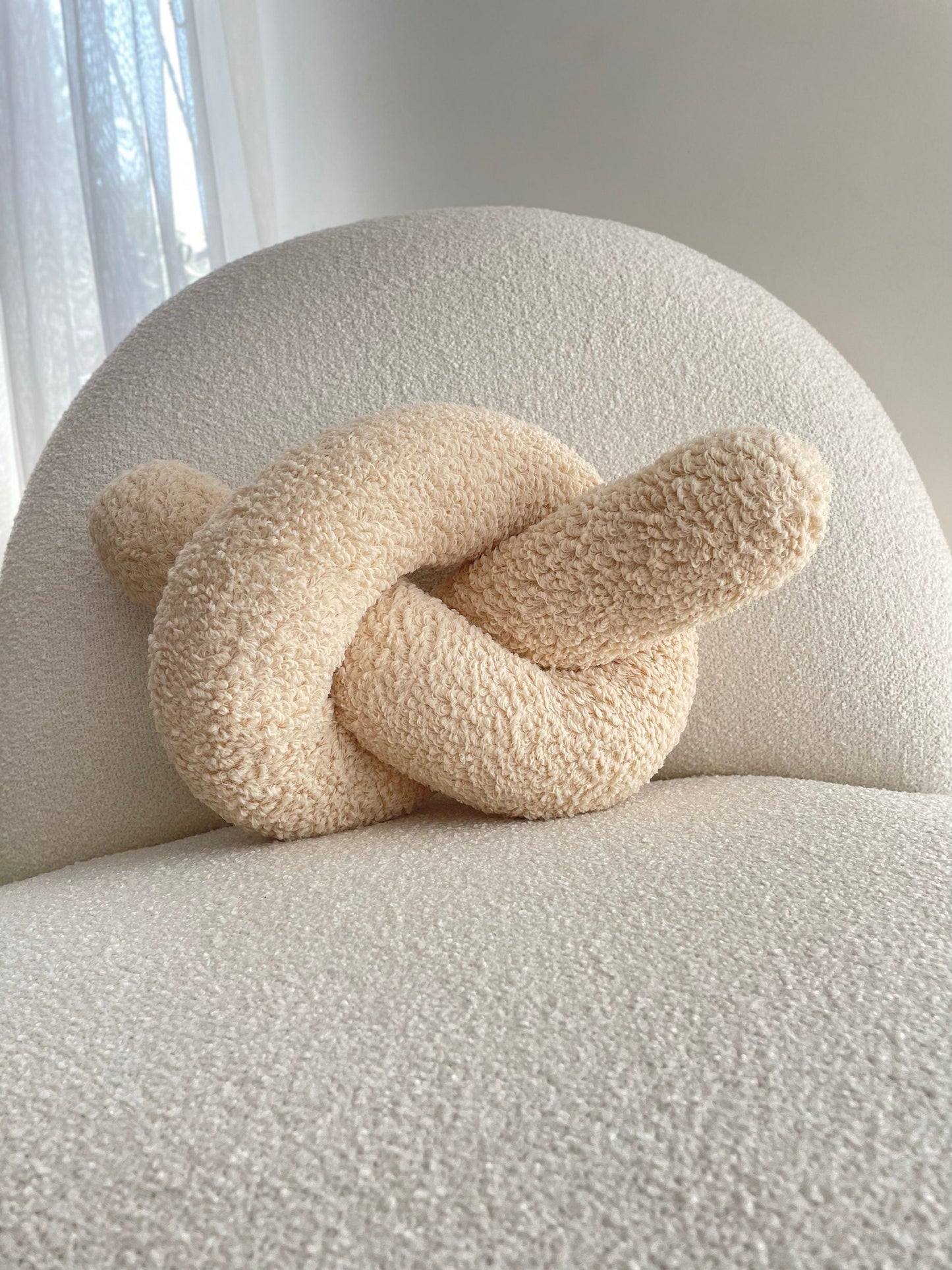 Soft Beige Boucle Knot Pillow: Chunky Decorative Cushion