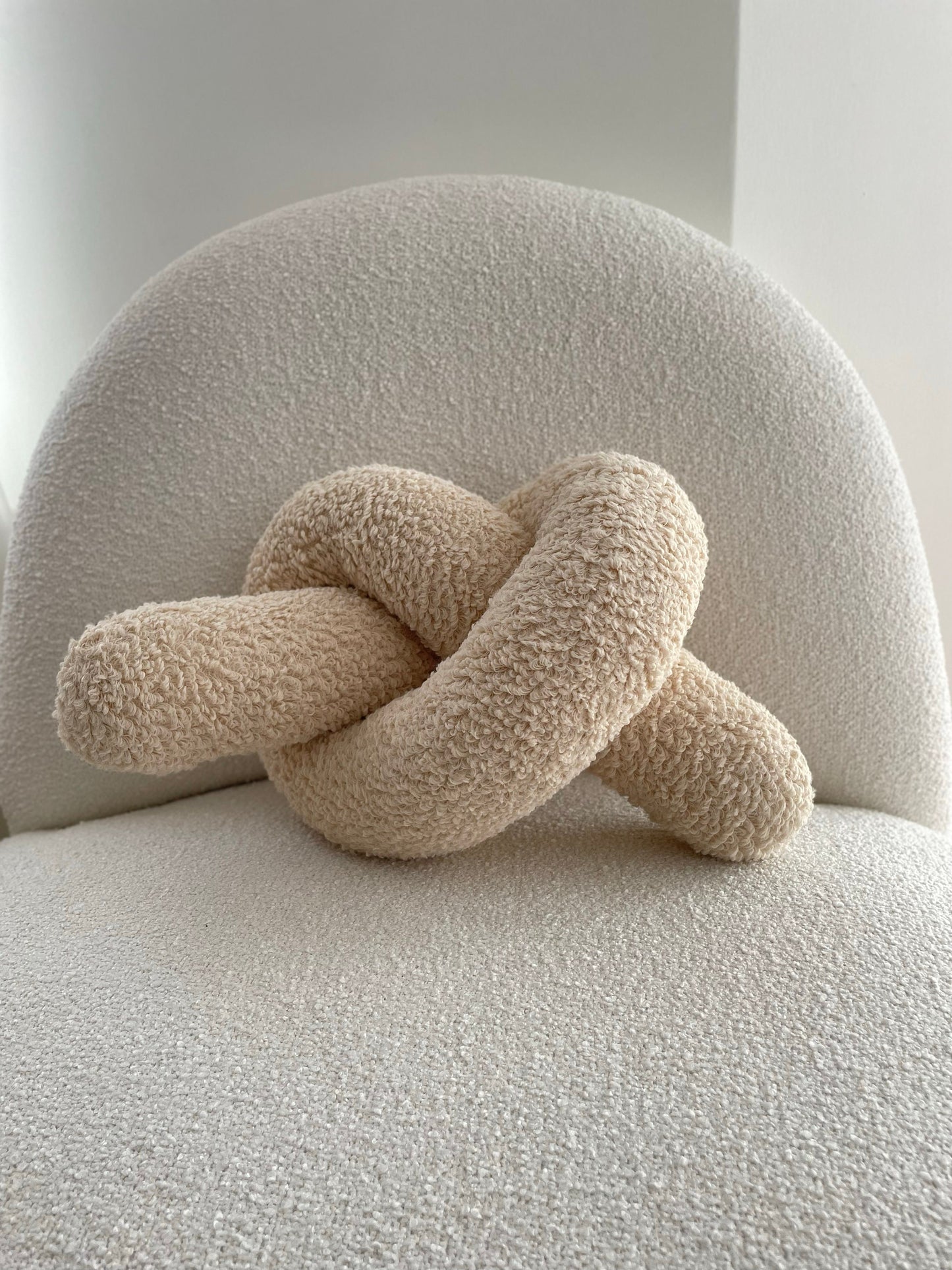 Soft Beige Boucle Knot Pillow: Chunky Decorative Cushion
