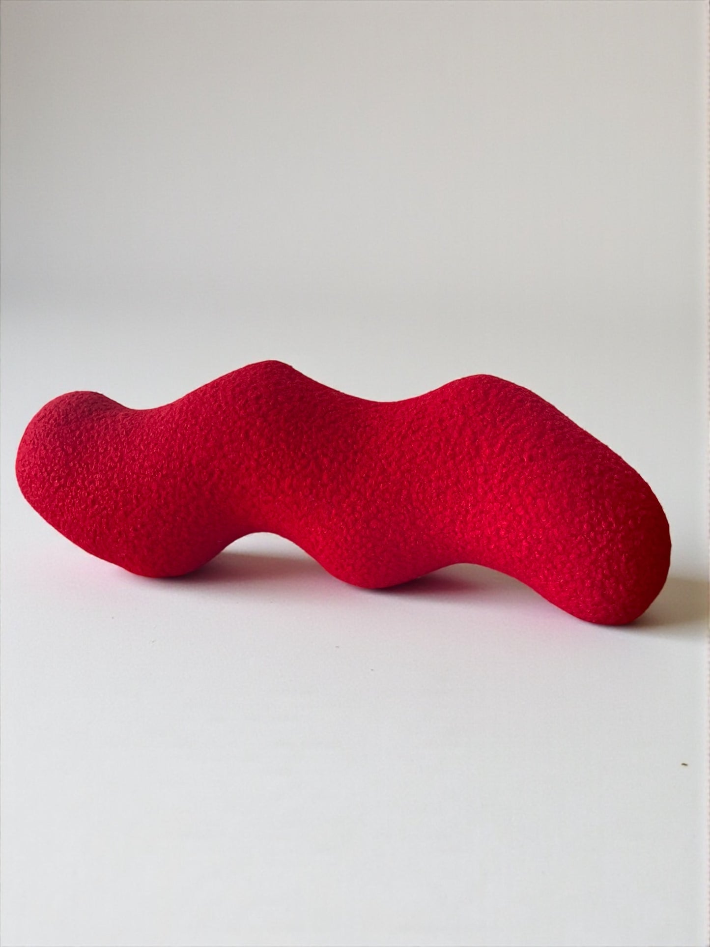 Red Boucle Wavy Pillow: Modern Accent Cushion