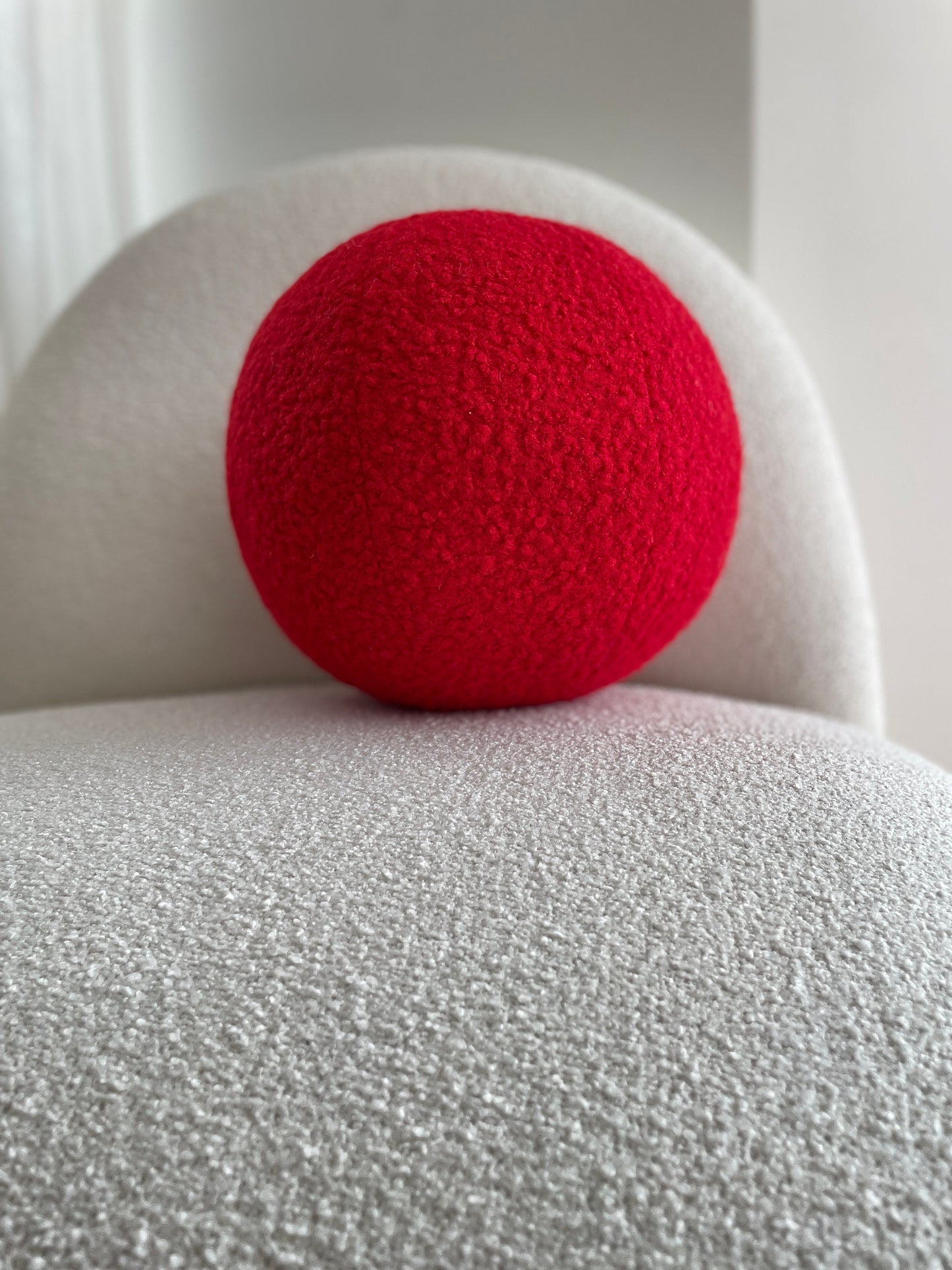 Red Boucle Sphere Cushion: Modern Minimalist Home Decor