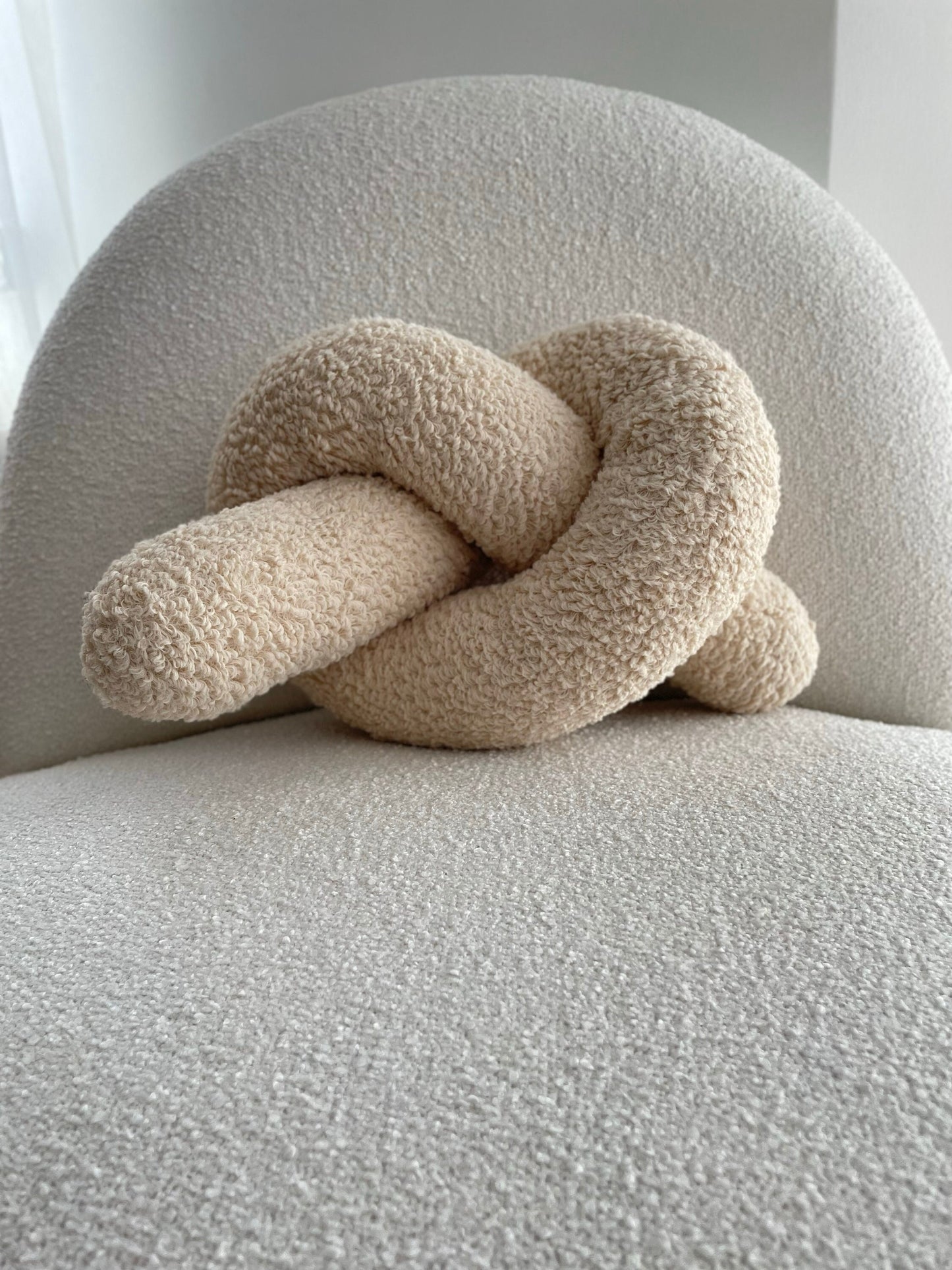 Soft Beige Boucle Knot Pillow: Chunky Decorative Cushion
