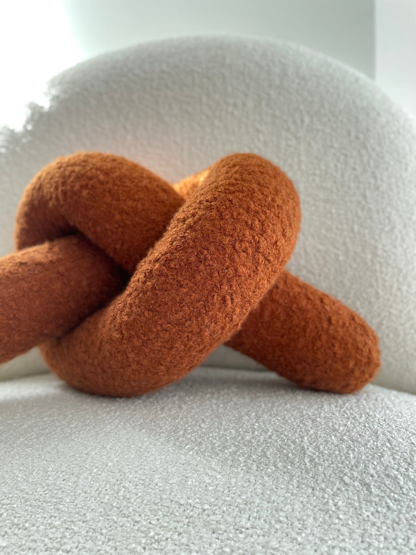 Boucle Knot Pillow: Terracotta Pretzel Plush Cushion