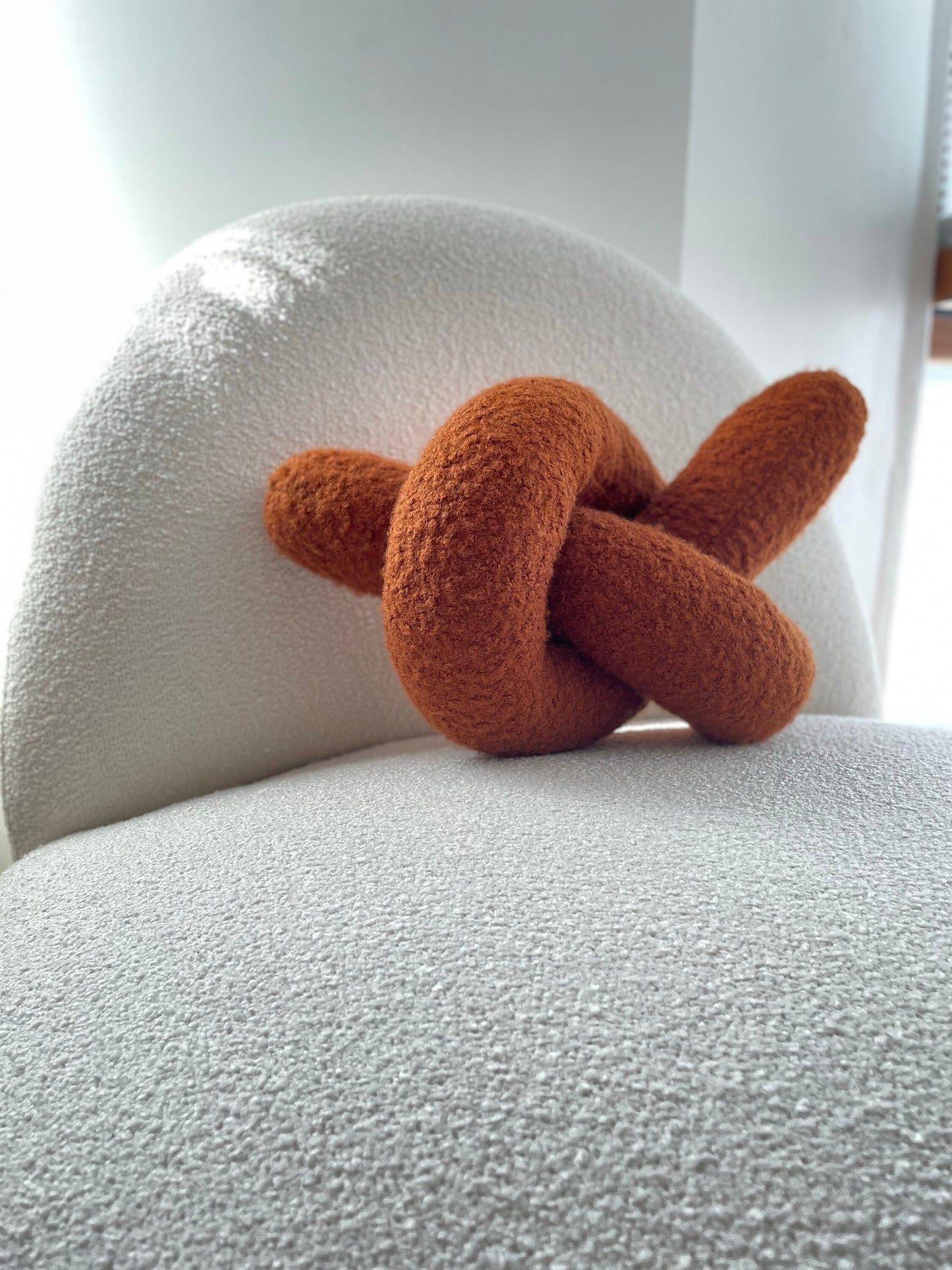 Boucle Knot Pillow: Terracotta Pretzel Plush Cushion