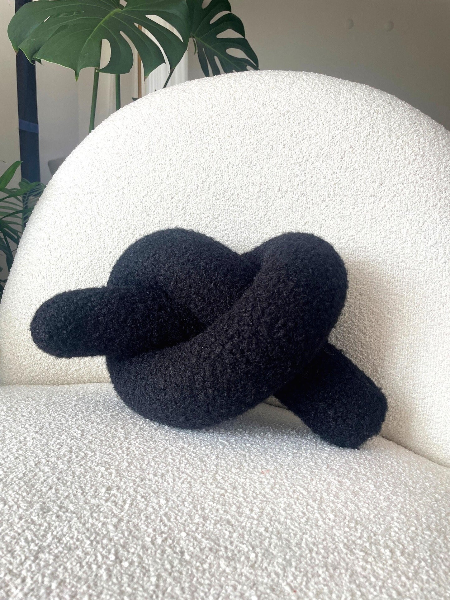 Black Boucle Knot Pillow: Modern Decorative Cushion