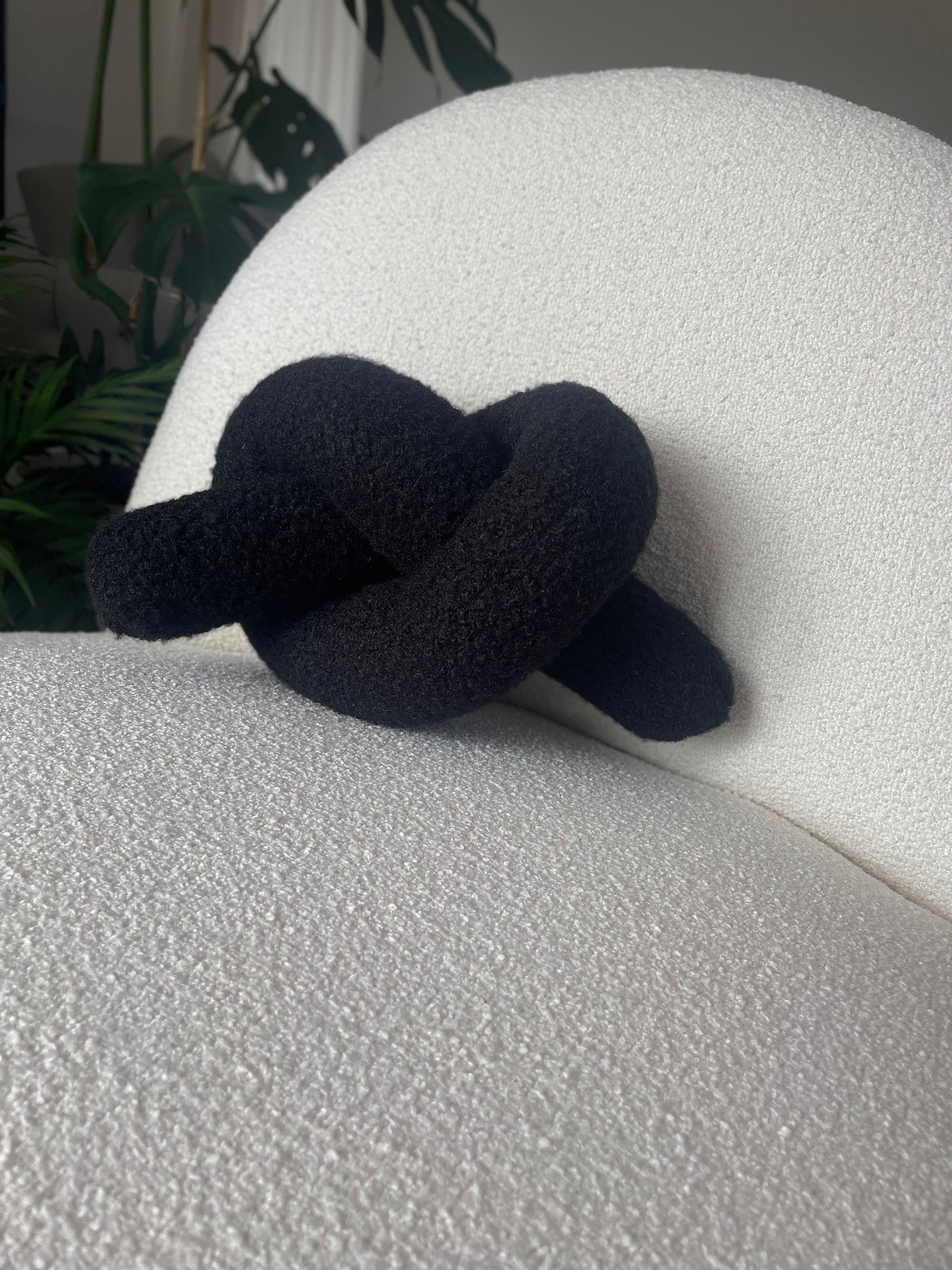 Black Boucle Knot Pillow: Modern Decorative Cushion