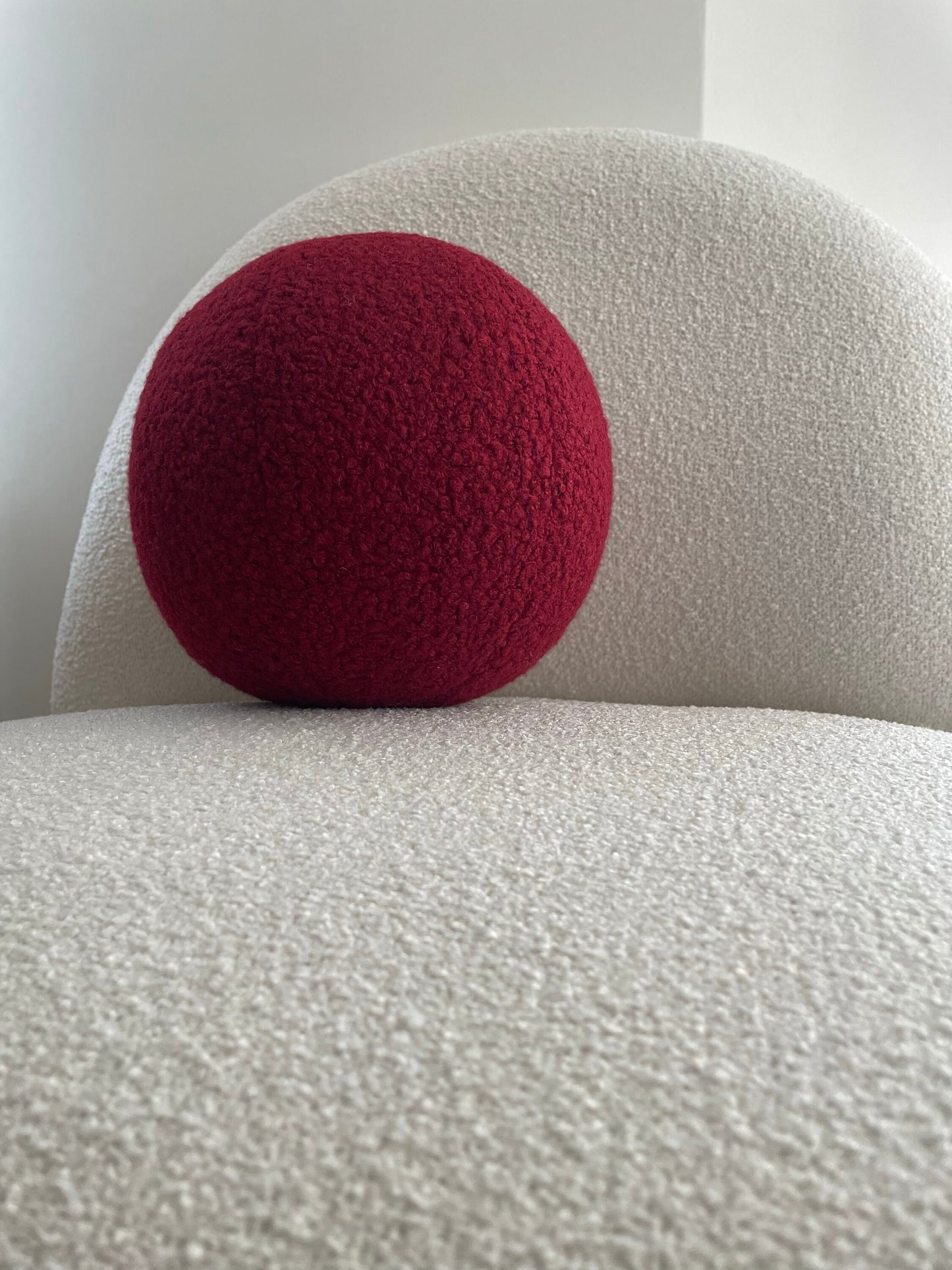 Burgundy Boucle Ball Pillow: Modern Minimalist Home Decor