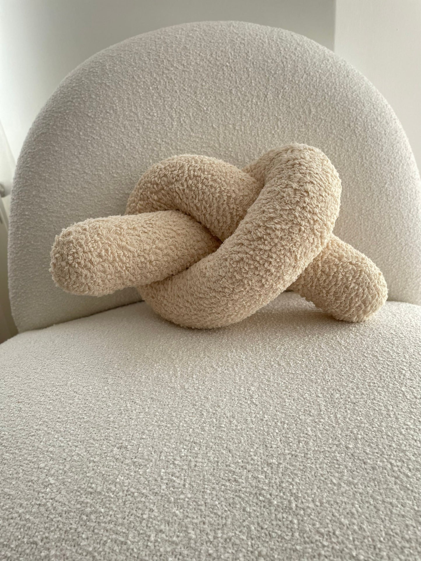 Soft Beige Boucle Knot Pillow: Chunky Decorative Cushion