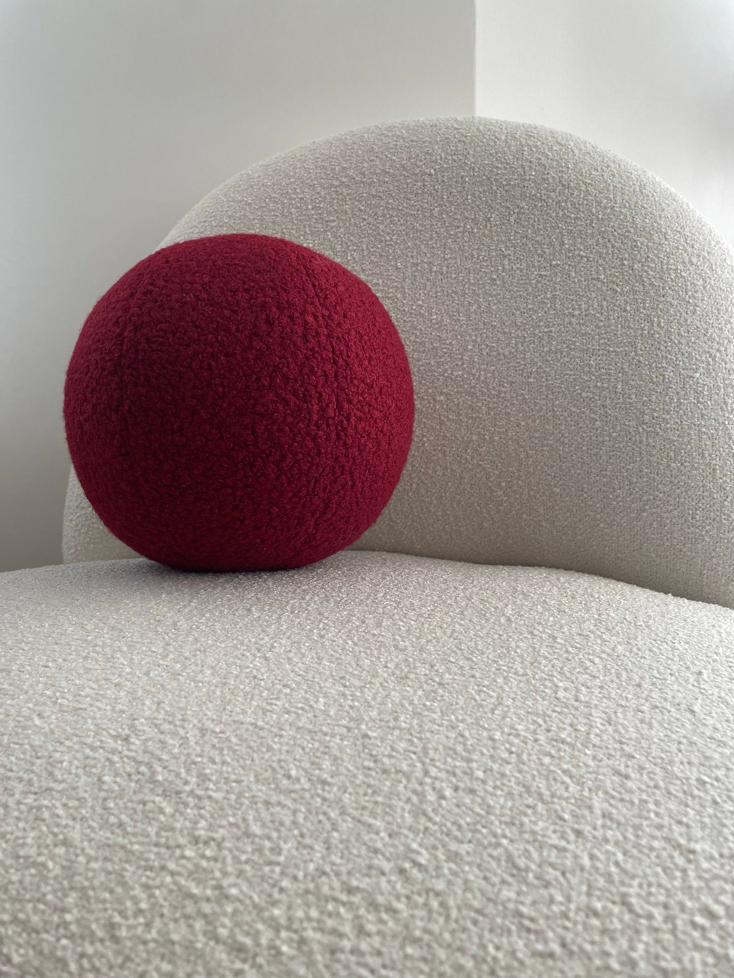Burgundy Boucle Ball Pillow: Modern Minimalist Home Decor