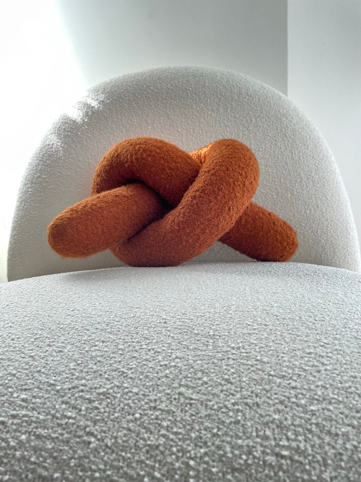Boucle Knot Pillow: Terracotta Pretzel Plush Cushion