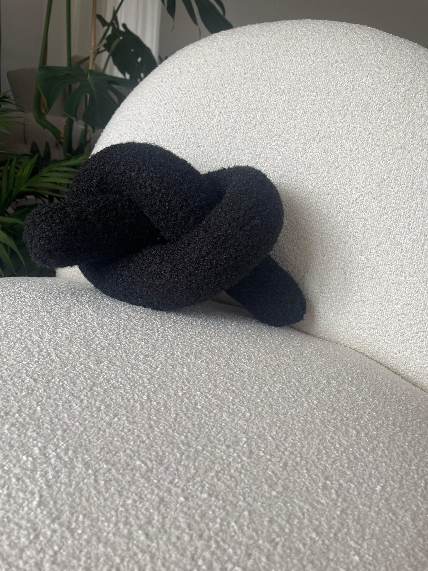 Black Boucle Knot Pillow: Modern Decorative Cushion