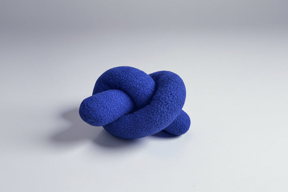 Blue Boucle Knot Pillow: Modern Accent Cushion