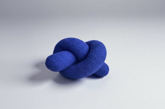 Blue Boucle Knot Pillow: Modern Accent Cushion