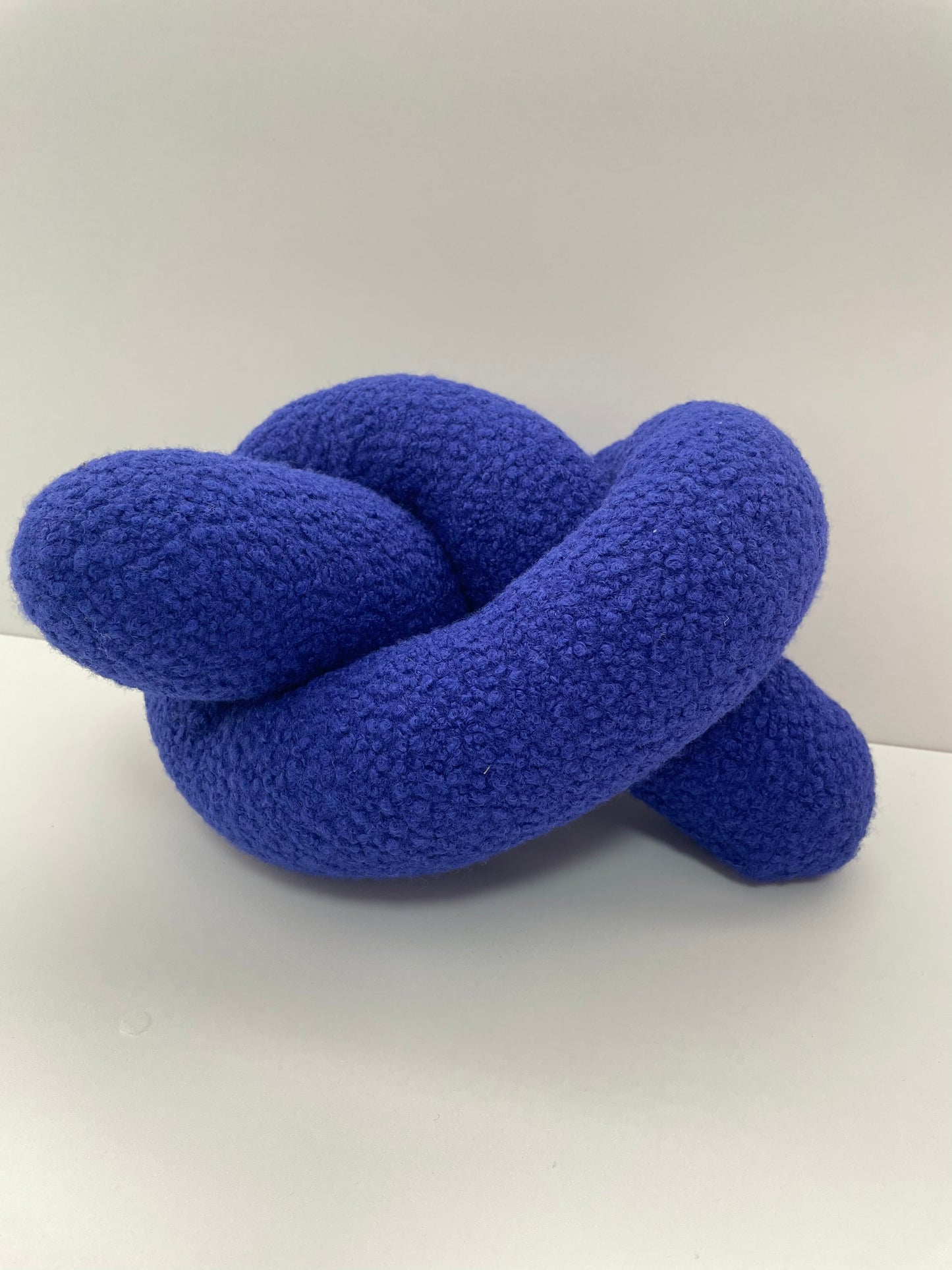 Blue Boucle Knot Pillow: Modern Accent Cushion