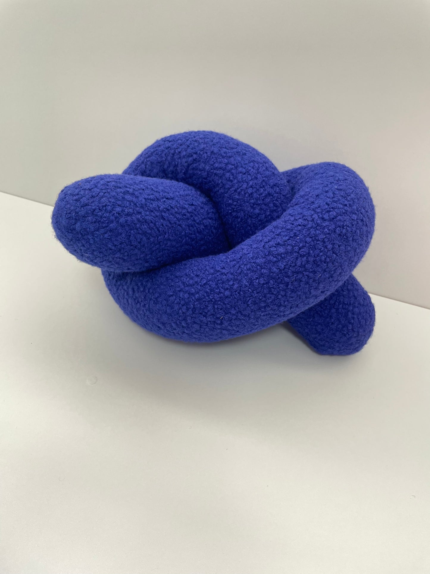 Blue Boucle Knot Pillow: Modern Accent Cushion