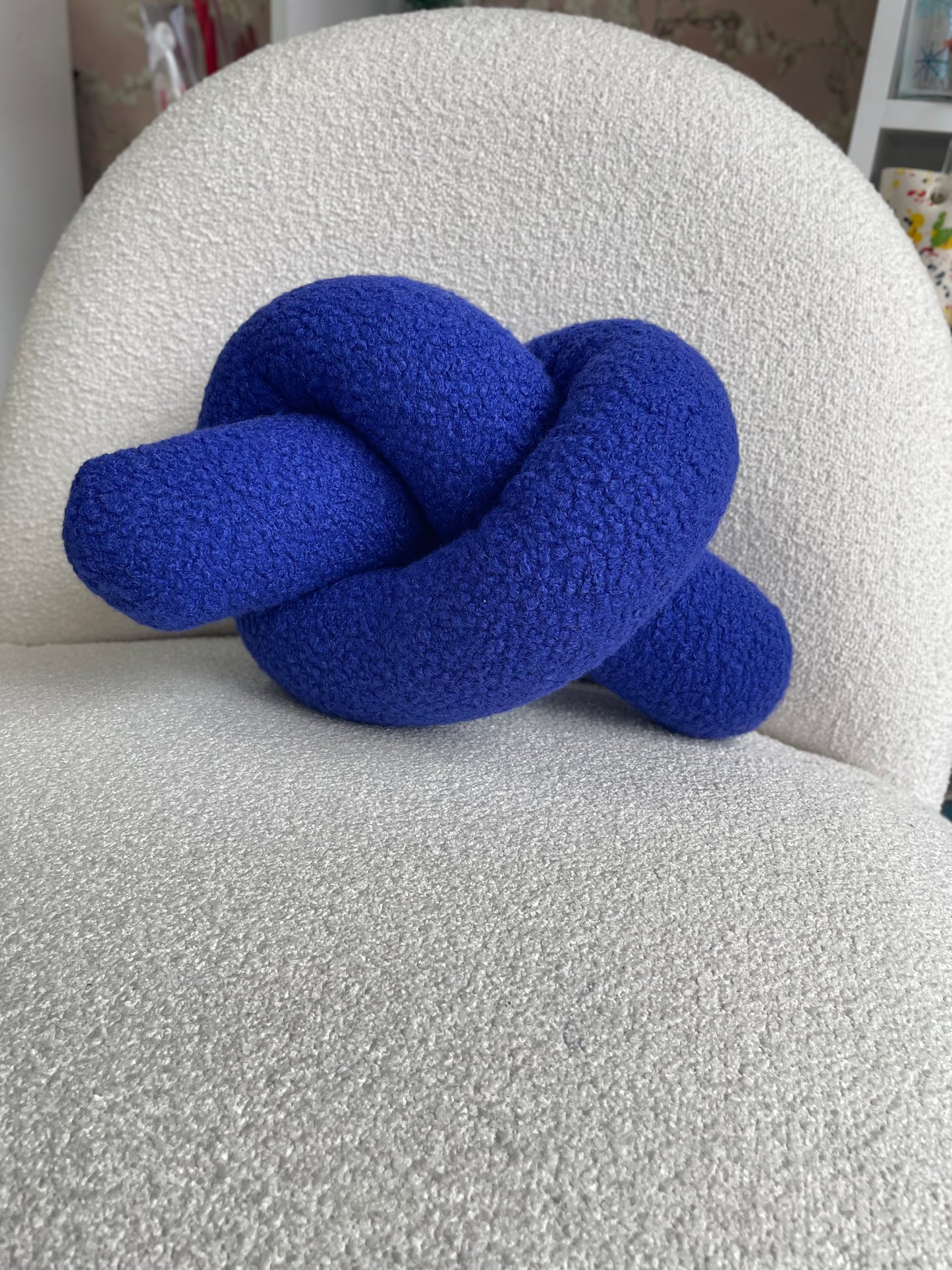 Blue Boucle Knot Pillow: Modern Accent Cushion