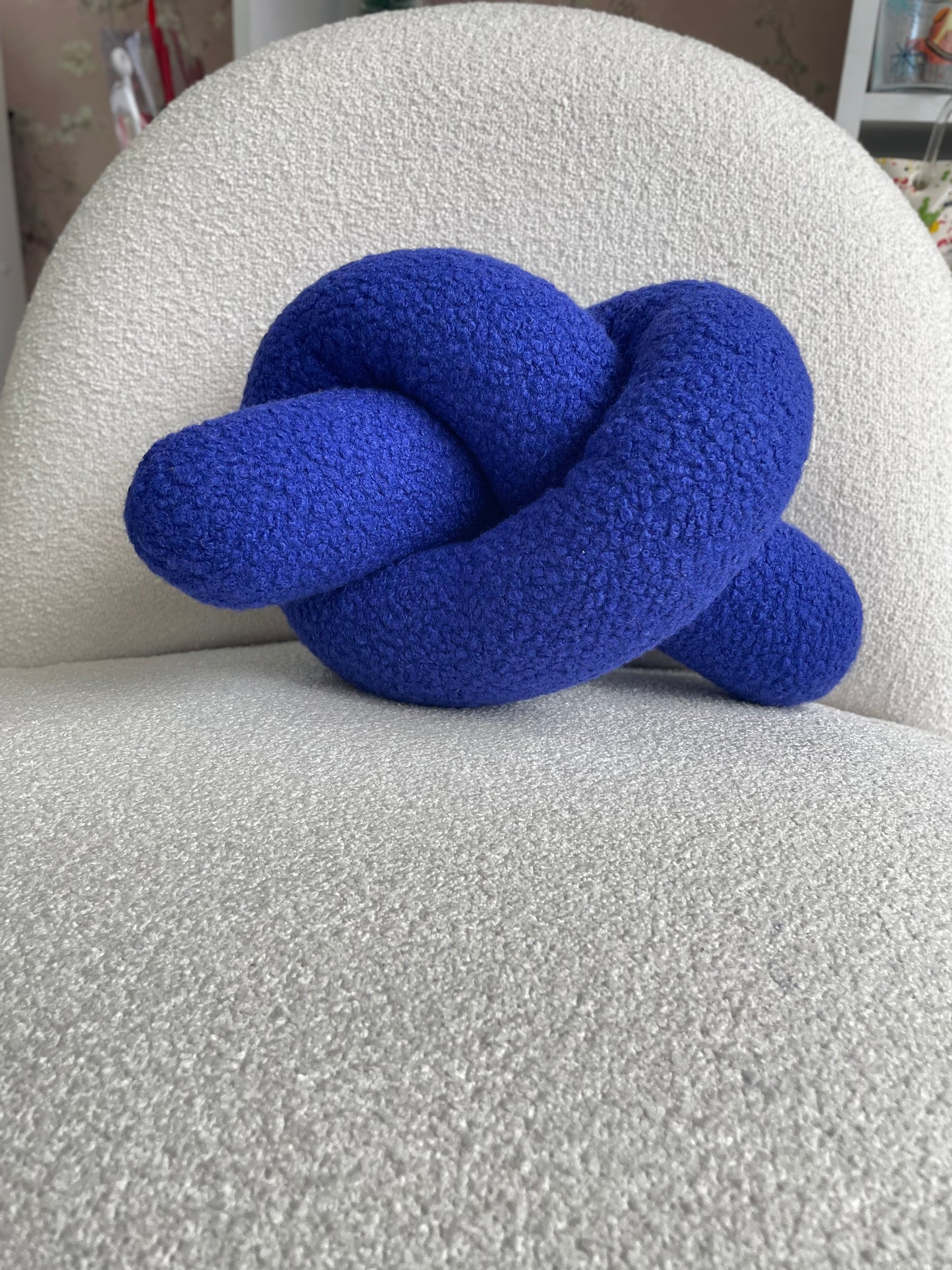 Blue Boucle Knot Pillow: Modern Accent Cushion