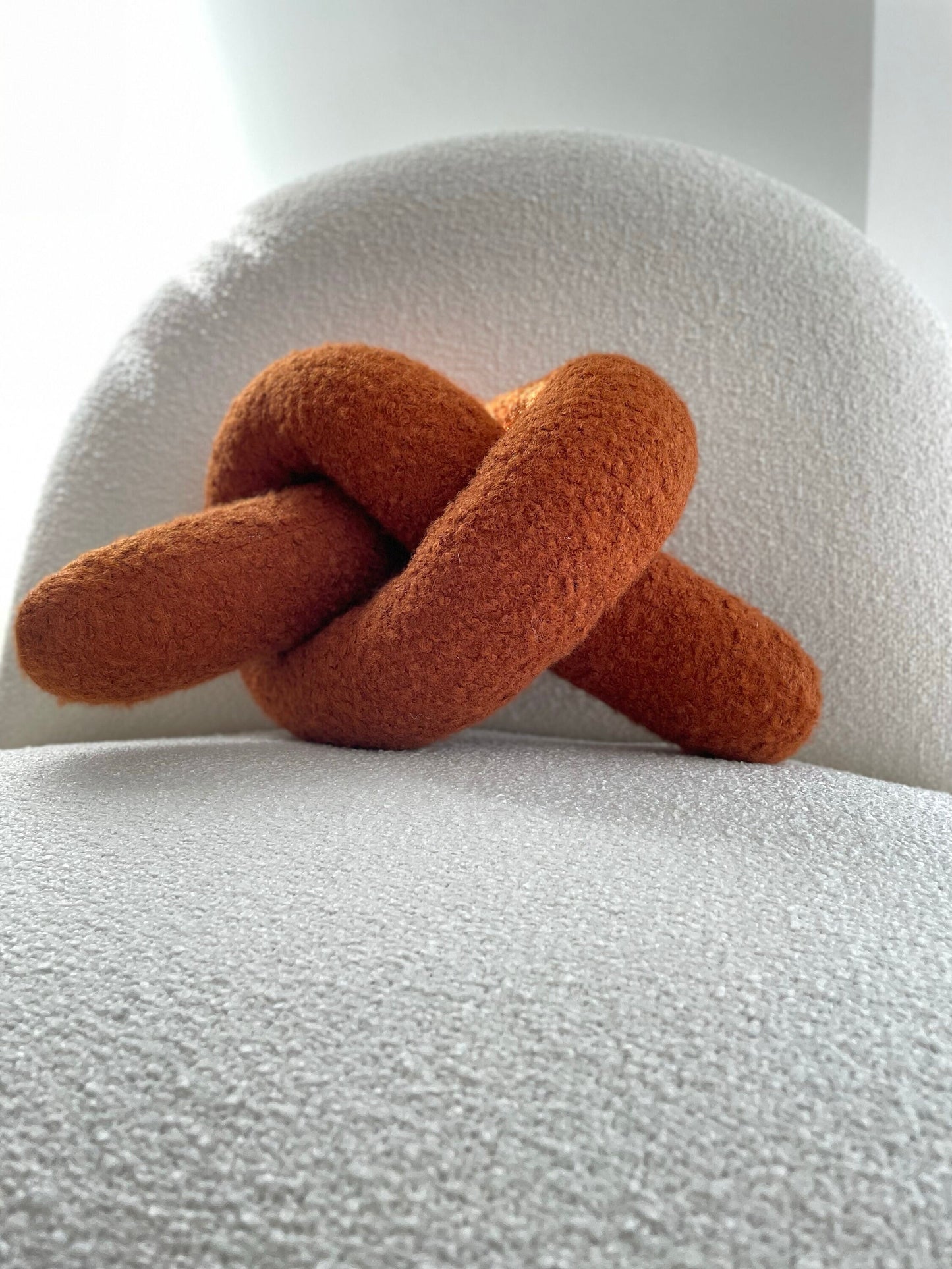 Boucle Knot Pillow: Terracotta Pretzel Plush Cushion