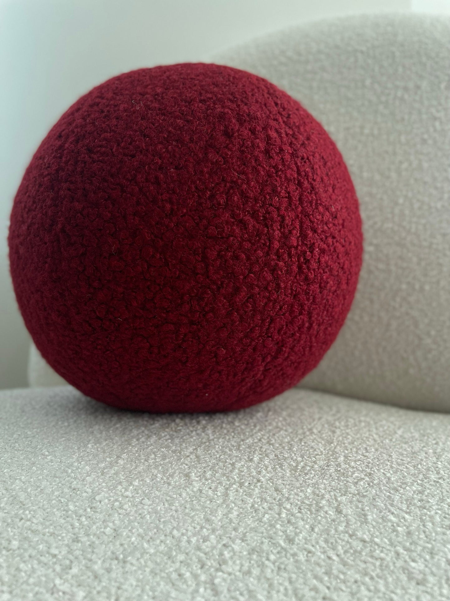 Burgundy Boucle Ball Pillow: Modern Minimalist Home Decor