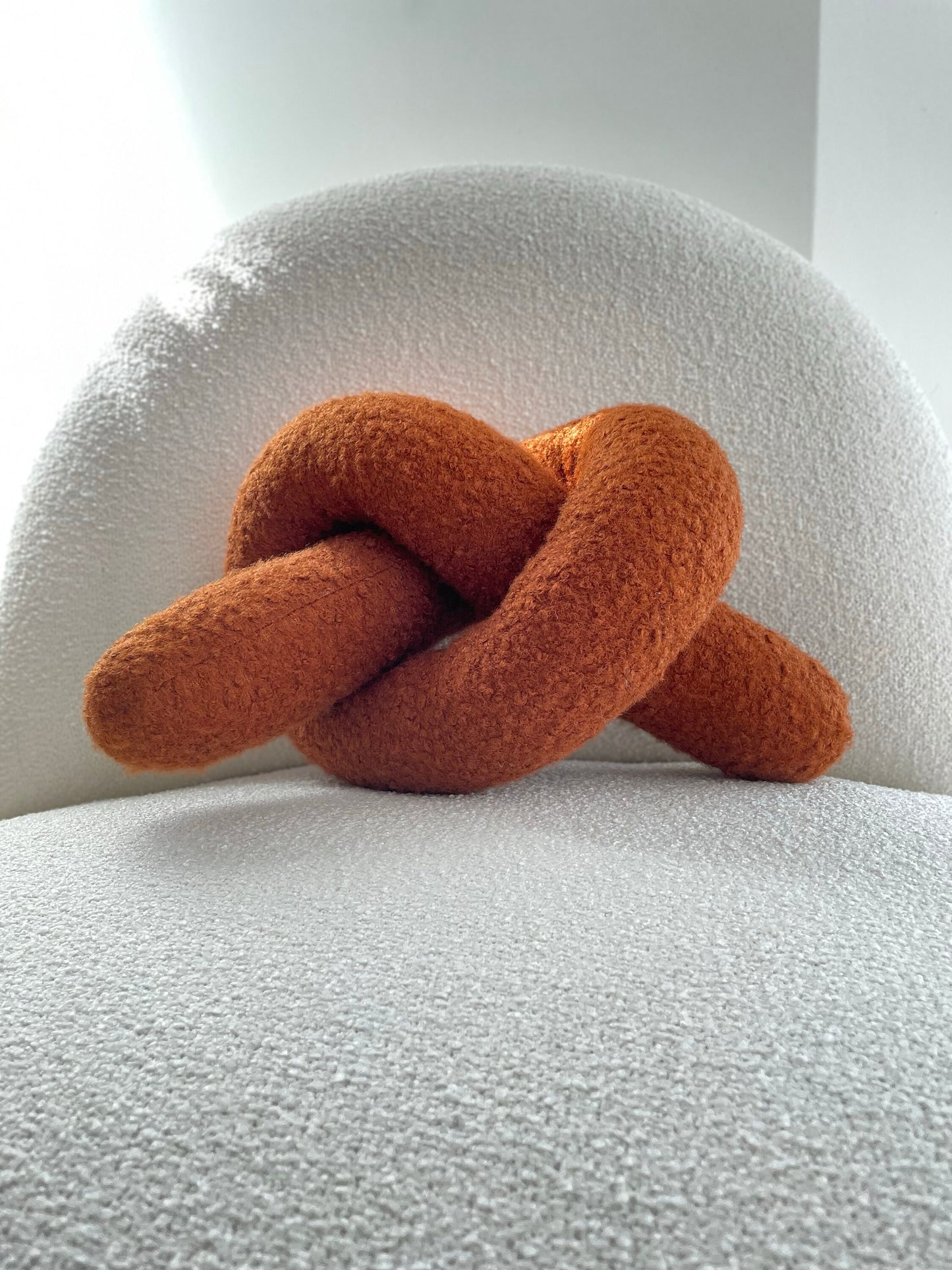 Boucle Knot Pillow: Terracotta Pretzel Plush Cushion