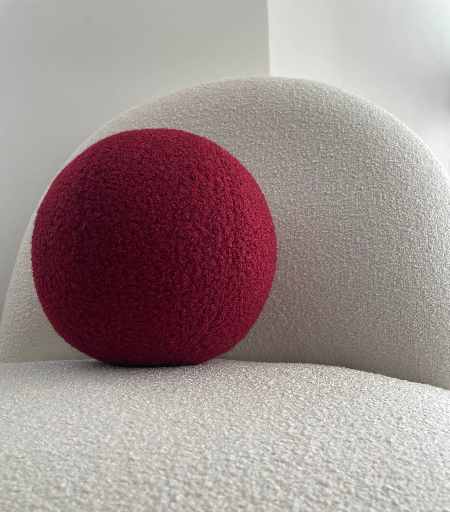 Burgundy Boucle Ball Pillow: Modern Minimalist Home Decor