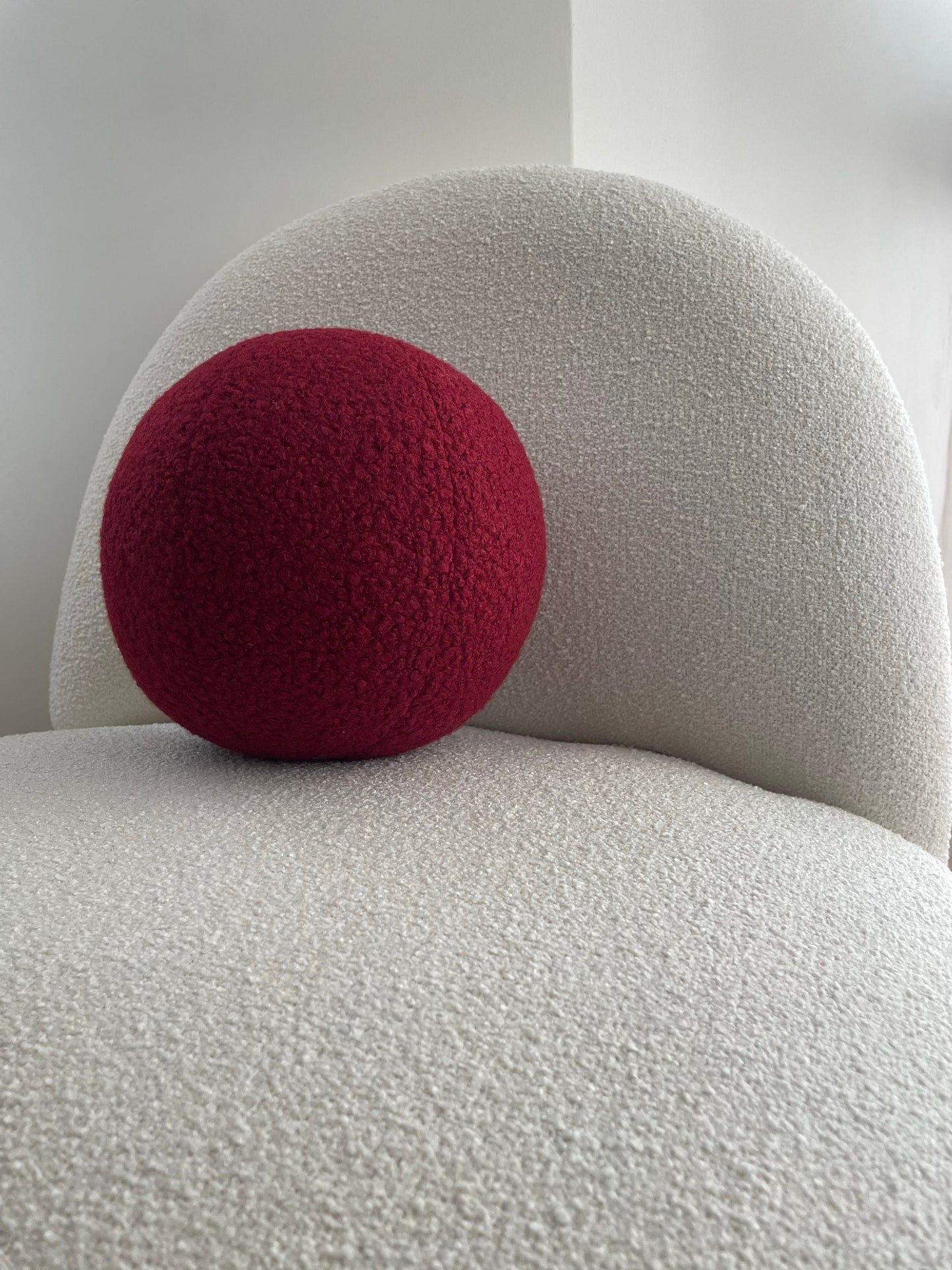 Burgundy Boucle Ball Pillow: Modern Minimalist Home Decor