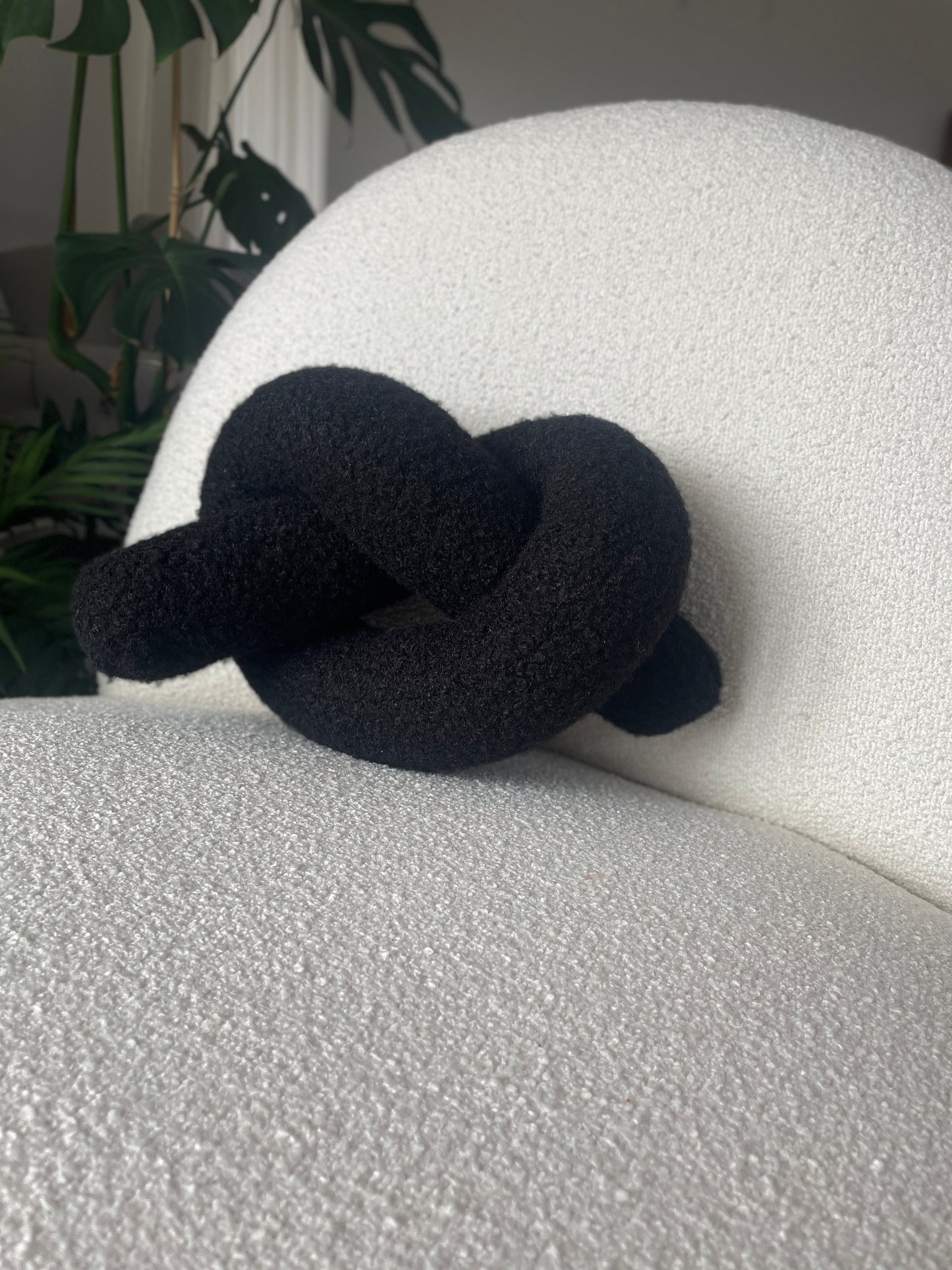 Black Boucle Knot Pillow: Modern Decorative Cushion